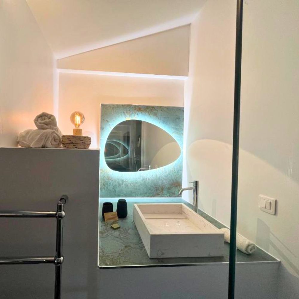 Salle de bains privative de la Chambre Iris avec douche italienne
